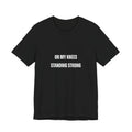 On My Knees Standing Strong T-Shirt — Inspirational Faith Tee